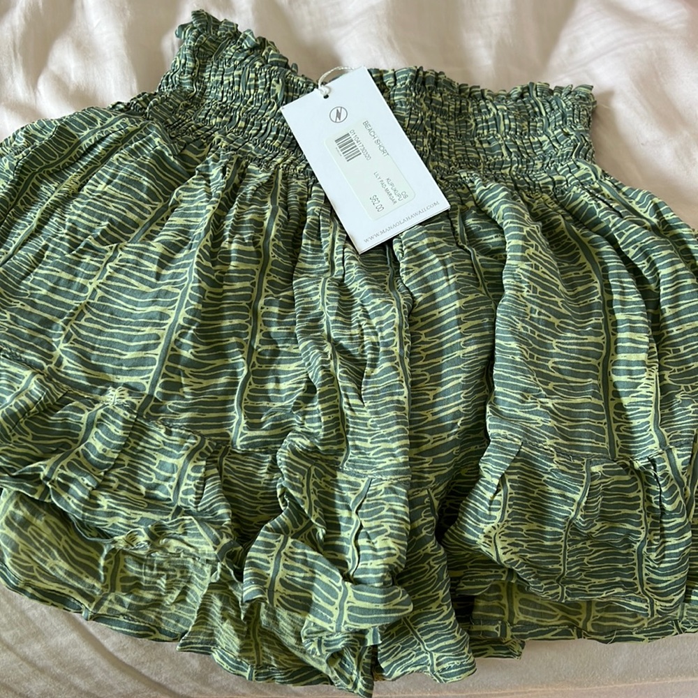 MANAOLA beach shorts, never worn, with tags